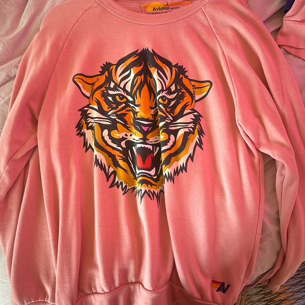 Pink tiger crewneck from aviator nation.